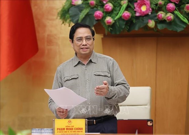 PM highlights need for safe adaptation to pandemic, containment solutions hinh anh 2