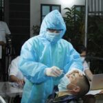 Vietnam records additional 9,690 COVID-19 cases on August 8 hinh anh 1