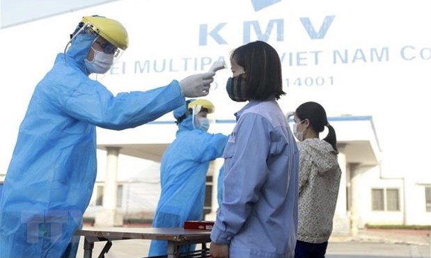 PM orders safety in industrial parks amidst COVID-19 resurgence hinh anh 2