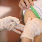 COVID-19 vaccination now covers children aged 12 - 17: MoH hinh anh 1