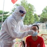 Vietnam reports 127,883 COVID-19 cases on March 23 hinh anh 1