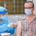 HCM City to vaccinate foreigners against COVID-19 hinh anh 1