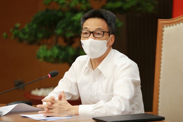 Vaccine self-sufficiency needed to return to new normal: Deputy PM hinh anh 2
