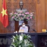 PM calls for further vigilance against COVID-19 hinh anh 1
