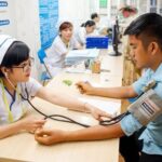 Vietnam works hard to reach universal health coverage by 2030 hinh anh 1