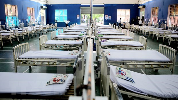 Localities asked to adopt three-tiered COVID-19 treatment model hinh anh 2
