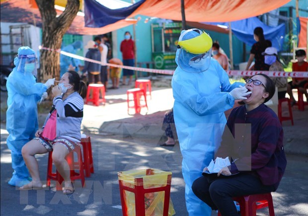 Vietnam records over 1,000 COVID-19 cases: No room for carelessness hinh anh 2