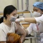 Vietnam reports 12,936 new COVID-19 infections on November 28 hinh anh 1