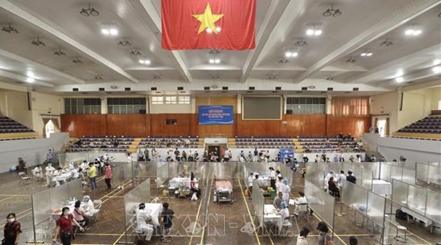 Ministry urges people to get vaccinated against COVID-19 hinh anh 2